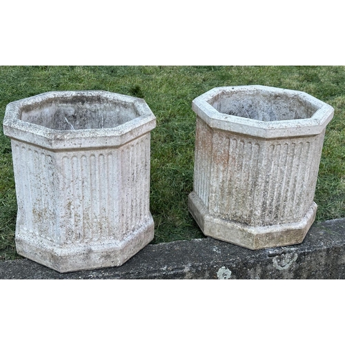 101 - GARDEN PLANTERS, a pair, well weathered reconstituted stone octagonal with fluted sides, 52cm H x 52... 