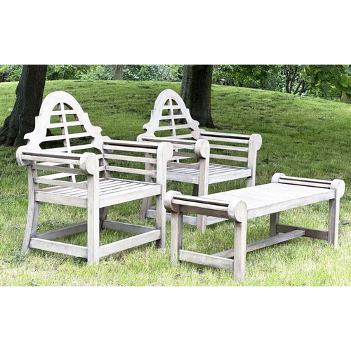 102 - LUTYENS STYLE GARDEN ARMCHAIRS AND TABLE, a pair, well weathered teak with companion low table all a... 