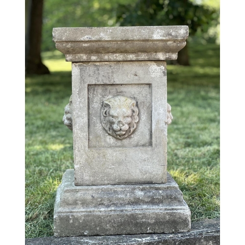 105 - GARDEN PLINTH/PLANTER, well weather reconstituted stone square form with lion mask detail and separa... 