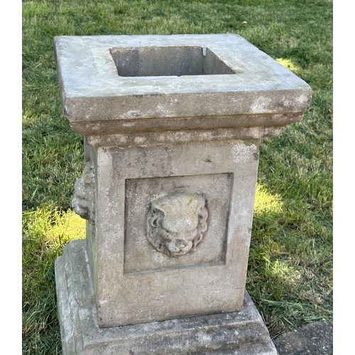 105 - GARDEN PLINTH/PLANTER, well weather reconstituted stone square form with lion mask detail and separa... 