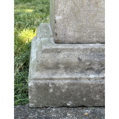 105 - GARDEN PLINTH/PLANTER, well weather reconstituted stone square form with lion mask detail and separa... 