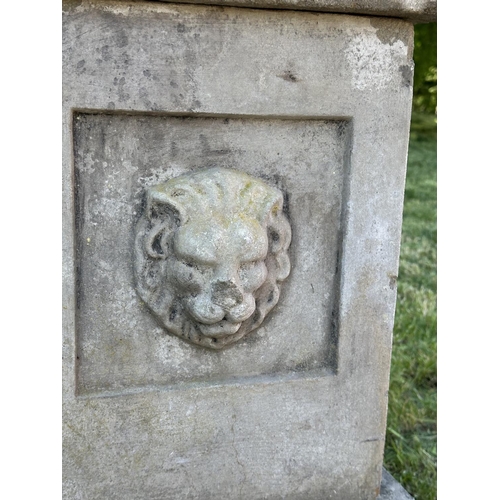 105 - GARDEN PLINTH/PLANTER, well weather reconstituted stone square form with lion mask detail and separa... 