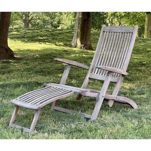 108 - GARDEN STEAMER CHAIR BY ALEXANDER ROSE, nicely weathered teak reclining with foot rest and cushions,... 