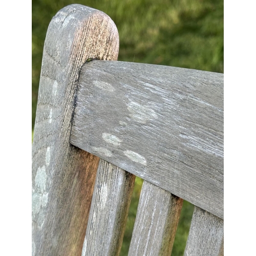 108 - GARDEN STEAMER CHAIR BY ALEXANDER ROSE, nicely weathered teak reclining with foot rest and cushions,... 