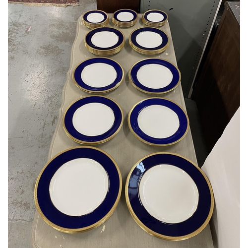 14 - WEDGWOOD BLUE PART DINNER SERVICE T GOODE AND CO LTD, cobalt blue banded with gold patterned trim, c... 