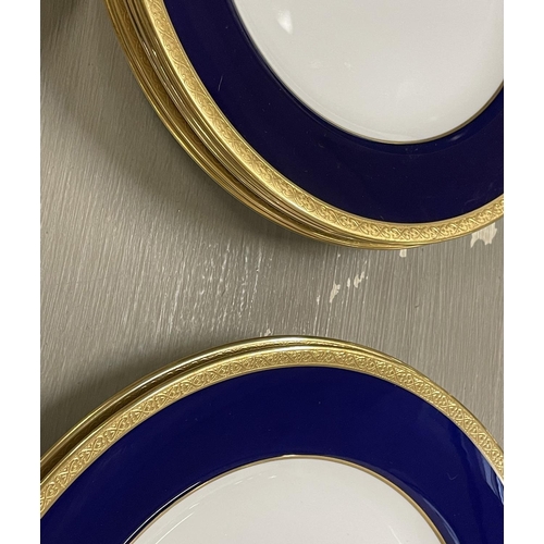 14 - WEDGWOOD BLUE PART DINNER SERVICE T GOODE AND CO LTD, cobalt blue banded with gold patterned trim, c... 