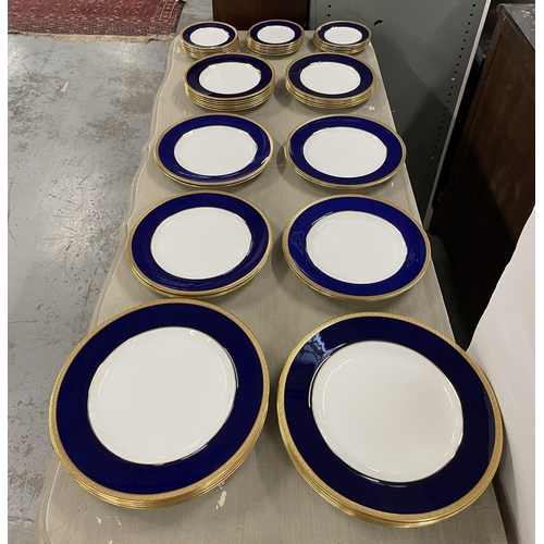 14 - WEDGWOOD BLUE PART DINNER SERVICE T GOODE AND CO LTD, cobalt blue banded with gold patterned trim, c... 