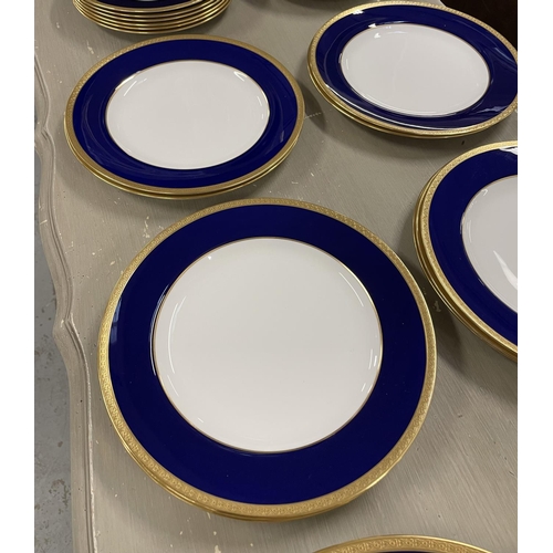 14 - WEDGWOOD BLUE PART DINNER SERVICE T GOODE AND CO LTD, cobalt blue banded with gold patterned trim, c... 