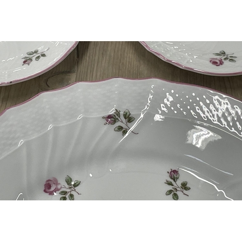 15 - PART DINNER AND TEA SERVICE, Richard Ginori, with rose springs and impressed patterned edge with sha... 