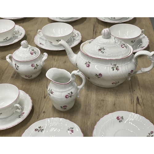 15 - PART DINNER AND TEA SERVICE, Richard Ginori, with rose springs and impressed patterned edge with sha... 