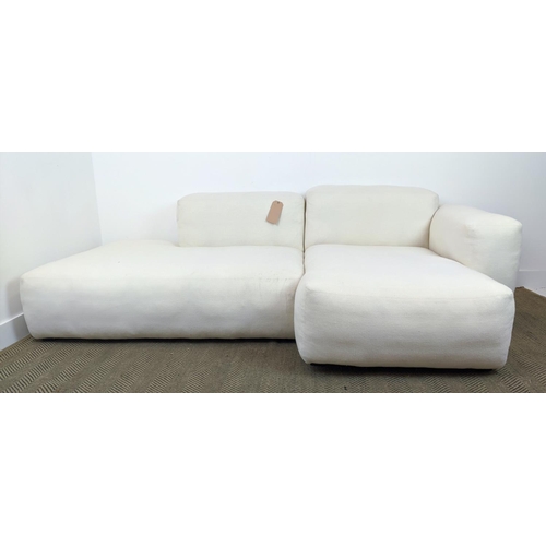 415 - CORNER SOFA, white fabric upholstered, with two scatter cushions, 235cm x 135cm x 64cm approx.