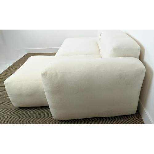 415 - CORNER SOFA, white fabric upholstered, with two scatter cushions, 235cm x 135cm x 64cm approx.