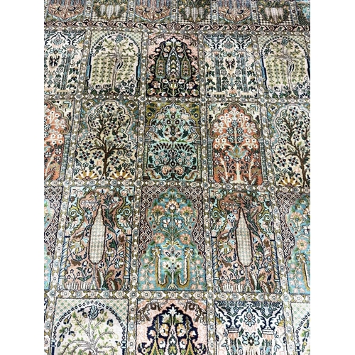 75 - FINE PURE SILK GARDEN DESIGN CARPET, 282cm x 187cm.