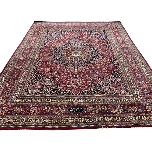 83 - PERSIAN MASHAD CARPET, 375cm x 305cm.