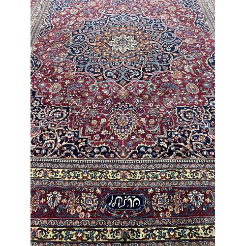 83 - PERSIAN MASHAD CARPET, 375cm x 305cm.