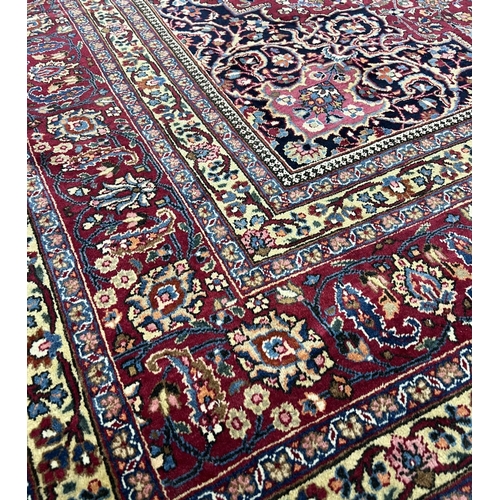 83 - PERSIAN MASHAD CARPET, 375cm x 305cm.