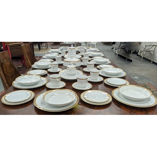 9 - DINNER SERVICE, twelve place setting with 24ct gold plated wreath border including side plates, teac... 