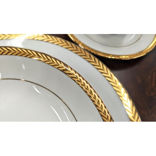 9 - DINNER SERVICE, twelve place setting with 24ct gold plated wreath border including side plates, teac... 