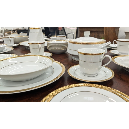 9 - DINNER SERVICE, twelve place setting with 24ct gold plated wreath border including side plates, teac... 