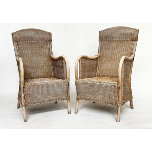 95 - GARDEN/ORANGERY ARMCHAIRS, a pair, rattan framed and cane panelled with arched backs and bent arms, ... 