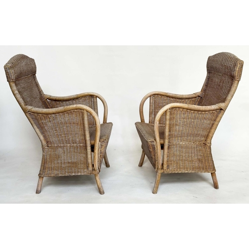 95 - GARDEN/ORANGERY ARMCHAIRS, a pair, rattan framed and cane panelled with arched backs and bent arms, ... 