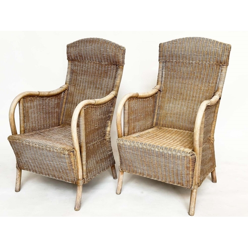 95 - GARDEN/ORANGERY ARMCHAIRS, a pair, rattan framed and cane panelled with arched backs and bent arms, ... 