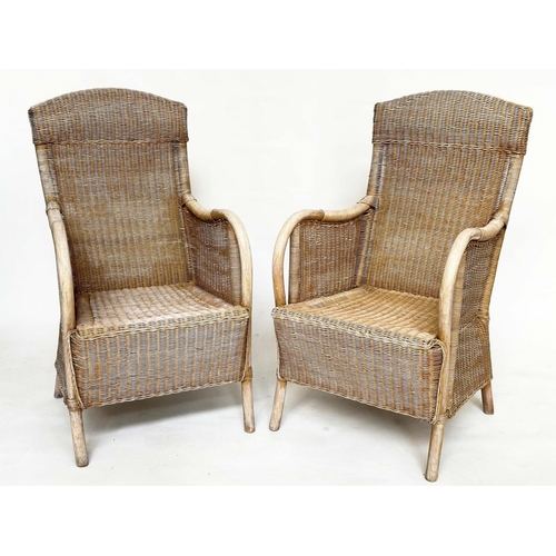 95 - GARDEN/ORANGERY ARMCHAIRS, a pair, rattan framed and cane panelled with arched backs and bent arms, ... 