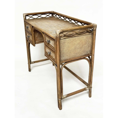 96 - BAMBOO WRITING TABLE BY 'Angraves' Leicester, rattan framed, wicker panelled and four short drawers,... 