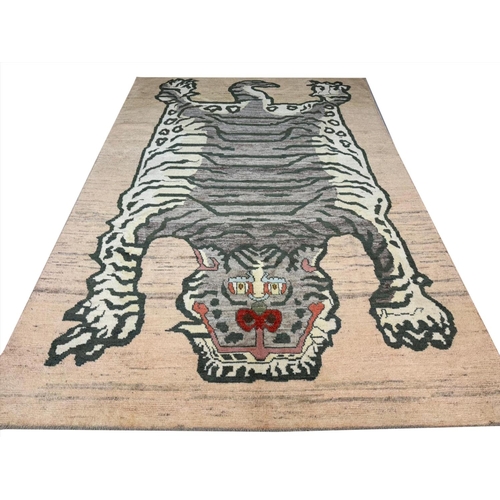 141 - FINE TIBETAN TIGER CARPET, 298cm x 205cm.