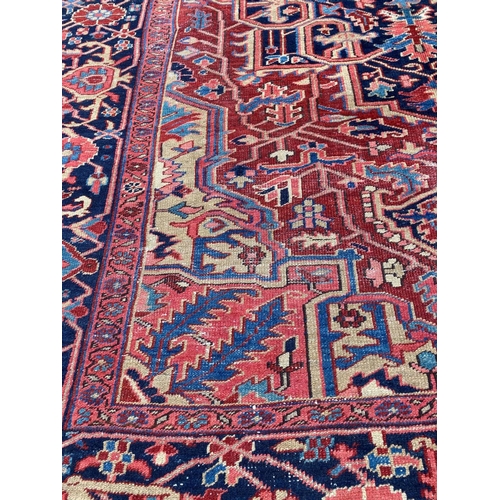 145 - ANTIQUE PERSIAN SERAPI CARPET, 346cm x 245cm.