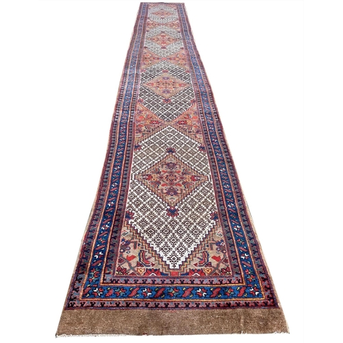 149 - ANTIQUE NORTH WEST PERSIAN SERAPI RUNNER, 535cm x 75cm.