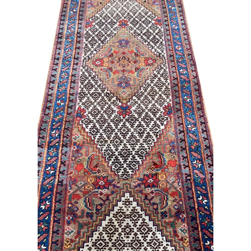 149 - ANTIQUE NORTH WEST PERSIAN SERAPI RUNNER, 535cm x 75cm.