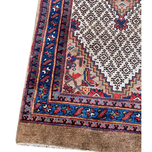 149 - ANTIQUE NORTH WEST PERSIAN SERAPI RUNNER, 535cm x 75cm.