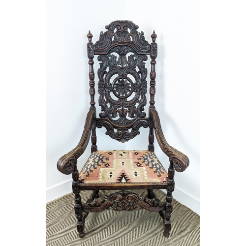 485 - ARMCHAIR, late 19th century Carolean style oak with high carved back and kilim padded seat, 141cm H ... 