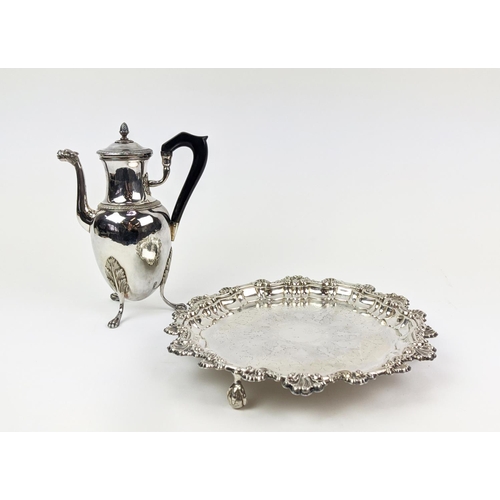 6 - A WHITE METAL HOT WATER POT, on three claw feet, together with a Rococo style salver on claw and bal... 