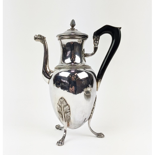 6 - A WHITE METAL HOT WATER POT, on three claw feet, together with a Rococo style salver on claw and bal... 