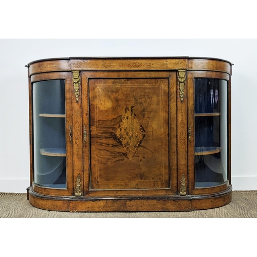 490 - CREDENZA, Victorian walnut, inlaid and brass mounted with a door flanked by bowed glazed doors enclo... 