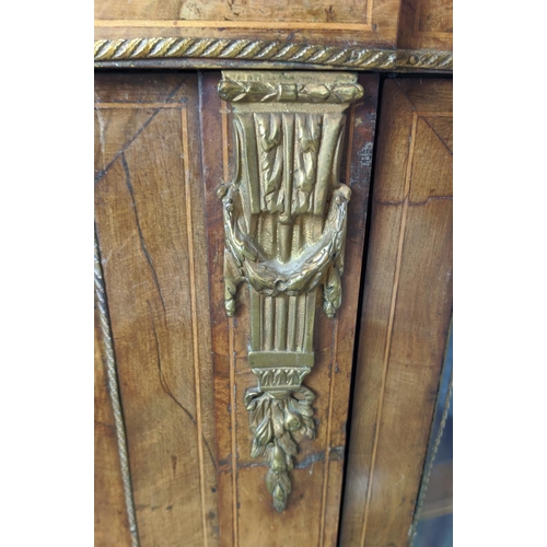 490 - CREDENZA, Victorian walnut, inlaid and brass mounted with a door flanked by bowed glazed doors enclo... 