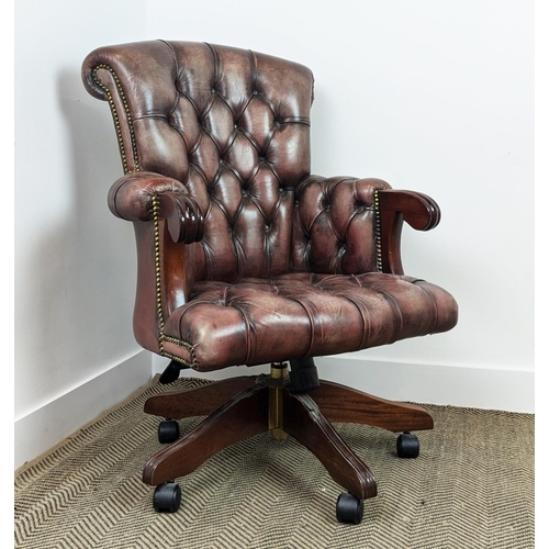 491 - DESK CHAIR, mahogany and faded burgundy leather with height adjustable swivel seat on castors, 68cm ... 