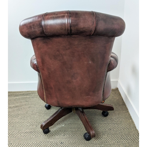 491 - DESK CHAIR, mahogany and faded burgundy leather with height adjustable swivel seat on castors, 68cm ... 