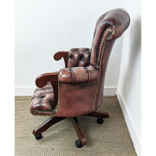 491 - DESK CHAIR, mahogany and faded burgundy leather with height adjustable swivel seat on castors, 68cm ... 