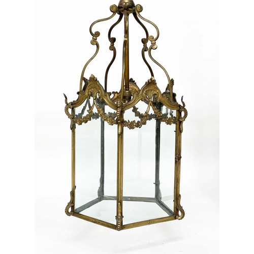 175 - HALL LANTERN, Georgian style gilt metal with glass panels and hinged door, 36cm W x 67cm H.