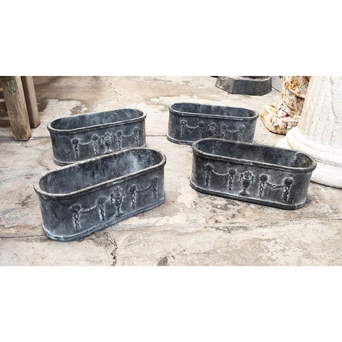 497 - PLANTERS, a set of four, cast metal, 28cm L. (4)