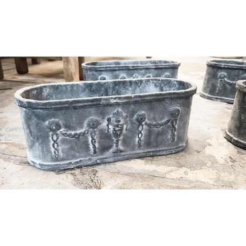 497 - PLANTERS, a set of four, cast metal, 28cm L. (4)