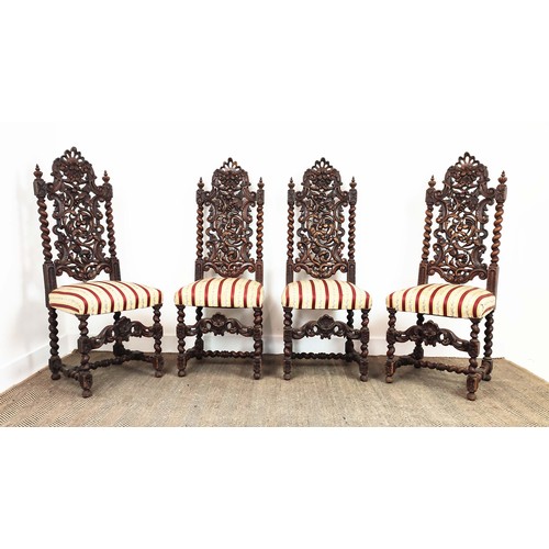 484 - DINING CHAIRS, a set of four, late 19th century Carolean style oak with carved backs and striped sea... 