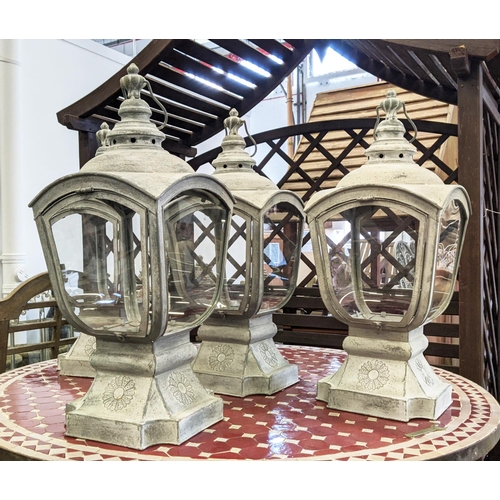 506 - STORM LANTERNS, a set of four, 66cm H.