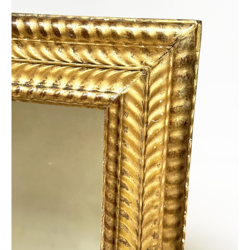 188 - WALL MIRROR, 19th century French rectangular carved giltwood with chevron and beaded frame, 88cm W x... 