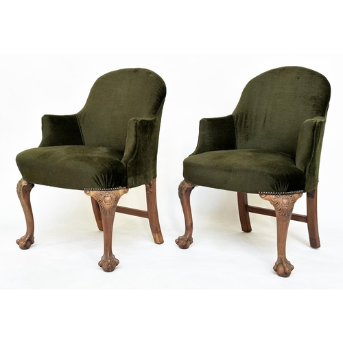 205 - ARMCHAIRS, a pair, early 20th century tub form moss green velvet upholstered each with carved walnut... 