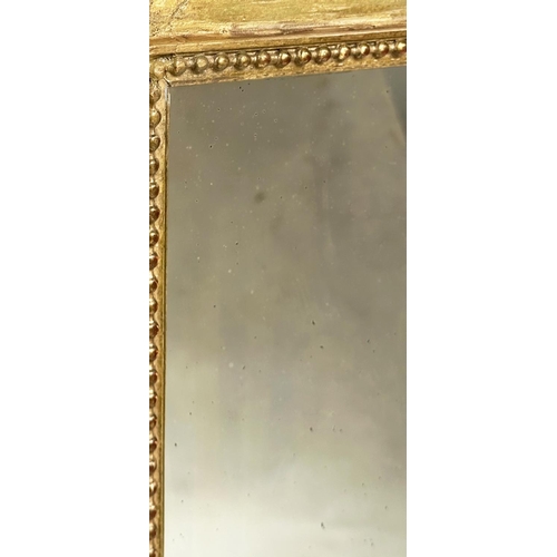 207 - WALL MIRROR, 19th century French rectangular giltwood and gesso moulded with beaded and rosette fram... 