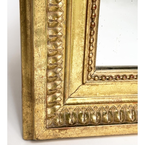 207 - WALL MIRROR, 19th century French rectangular giltwood and gesso moulded with beaded and rosette fram... 